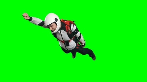 Skydiver Isolated on Green Screen Mid-Air