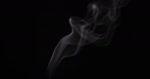 Long Footage of Realistic Atmospheric White Smoke on Dark Backdrop.