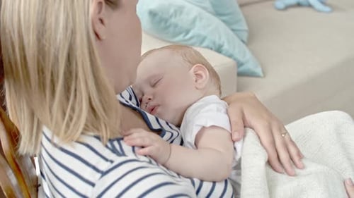 Mother with Sleeping Baby