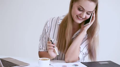 Blonde Business Woman Working at Modern Office
