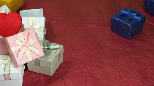 Festive Gift Boxes with Red Heart on Red