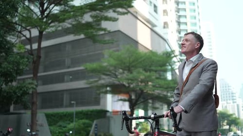 Businessman using smartphone for online business partner in city urban digital lifestyle technology.