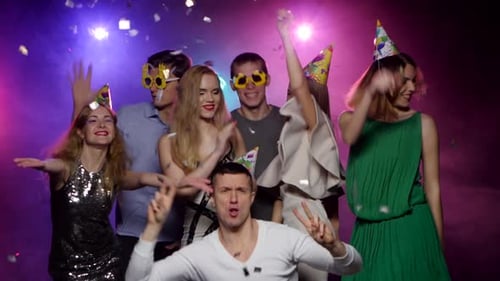 Cheerful Friends Celebrating and Dancing at Birthday Party