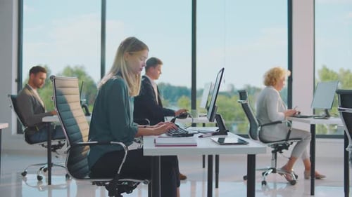 People working on computer in office