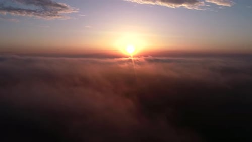 Golden Sunrise over a Sea of Clouds