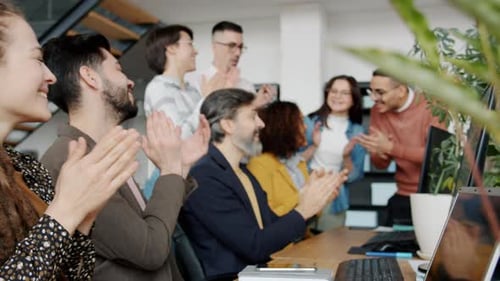 Office Team Applause for Business Success