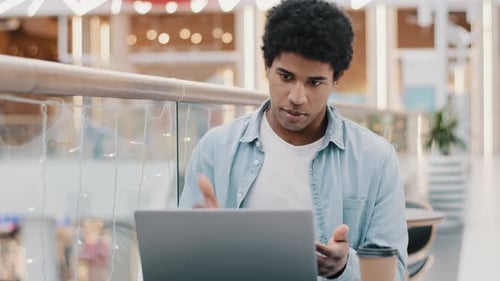 Young Adult Having an Online Meeting