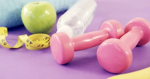 Health and Fitness Still Life on Purple Background