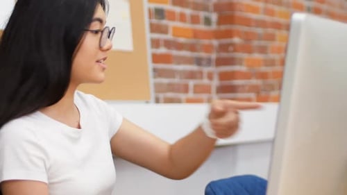 Businesswomen discussing over computer 4k