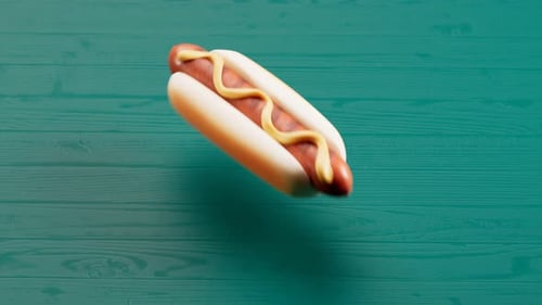Eating fast food. Delicious hot dog despairing piece by piece. Junk food. Snack.