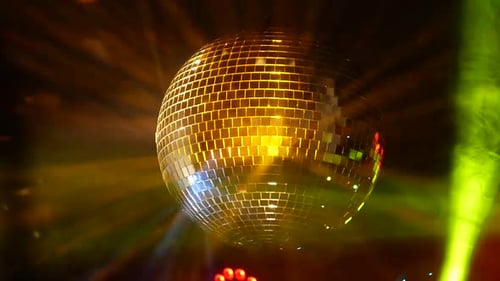 Shining Disco Ball Reflecting Vibrant Lights