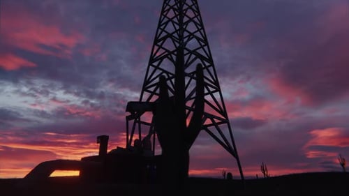Oil Rig and Cacti Silhouette at Desert Sunset