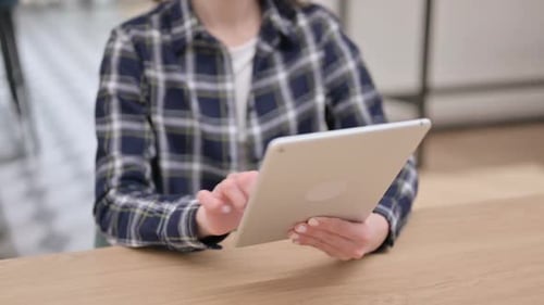 Female Hands Using Tablet Close Up