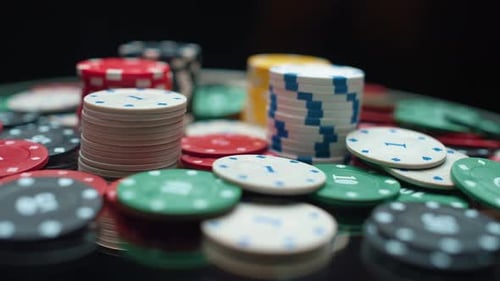 Casino Chips and Playing Cards in Motion