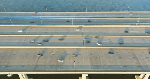 Panoramic Top View with High Speed Highway with Traffic Road the Bridge Across Over the River