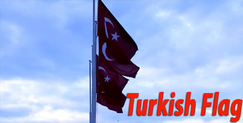 Turkish Flag Waving Proudly Against Cloudy Sky