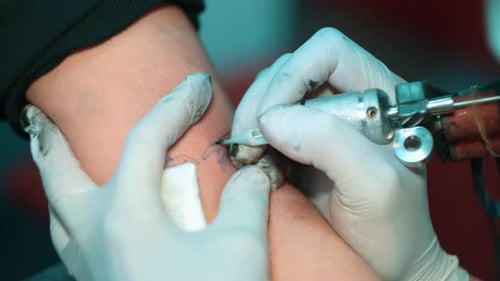Tattoo Needle Filled With Black Ink