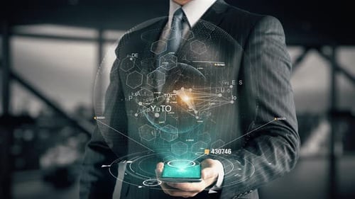 Businessman Activating Digital Metaverse Cryptocurrency Hologram from Smartphone