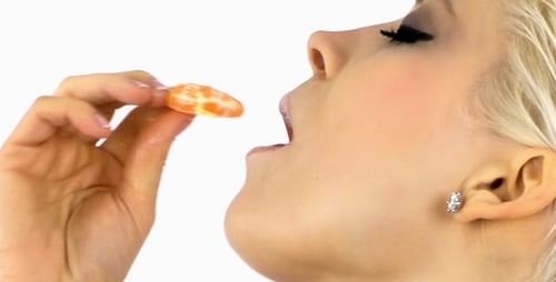 Woman Eating Fruit