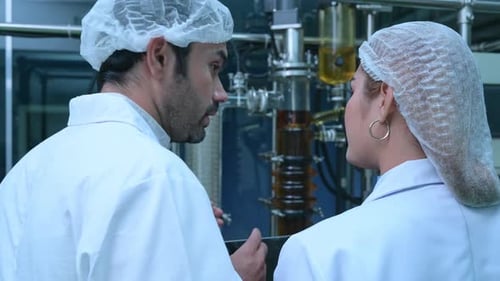 Scientists and assistants are in the machine room extracting oil and cannabis seeds.