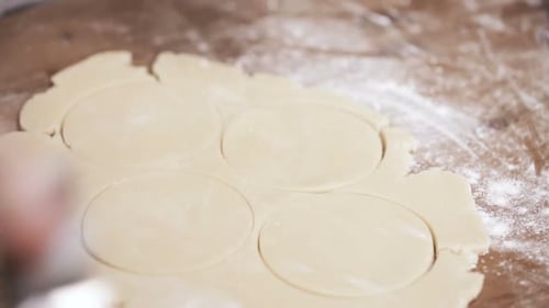 Cutting Cookie Dough with Cookie Cutters