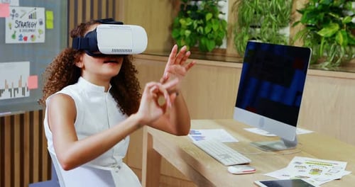 Woman Uses VR Headset in Modern Office