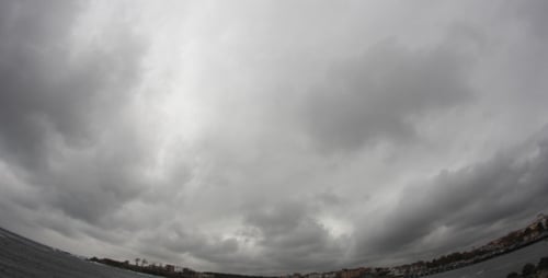 Cloudy Day over Beach and Coastal City