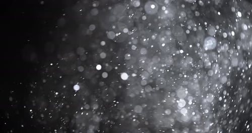 Abstract Particle Bokeh on Dark Background