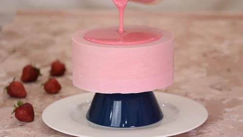 Pink Icing Glaze Poured Over Cake for Decoration