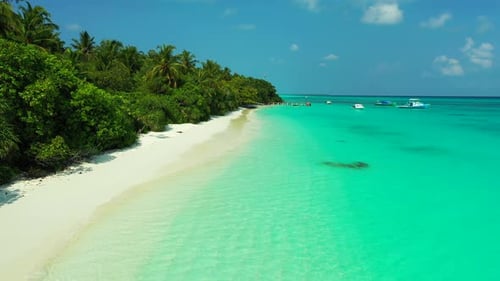 Beautiful overhead tourism shot of a white sand paradise beach and blue ocean background