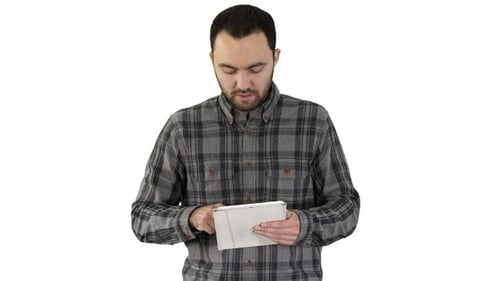 Young Adult Man Uses Touch Screen Tablet