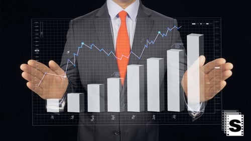 Man Gesturing at Augmented Reality Bar Chart