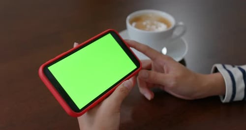 Woman Use of Mobile Phone with Green Screen