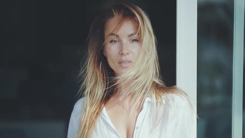 Beautiful Woman in White Shirt Posing