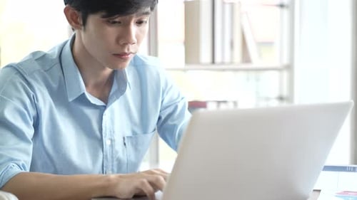 businessman typing a computer keyboard, working at the office or work from home, online work