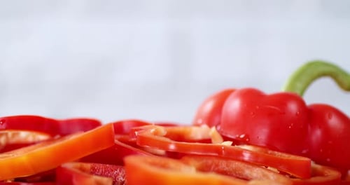 Sliced Red Bell Peppers with Water Droplets