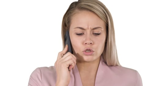 Blonde Woman Speaking on Phone in Close Up