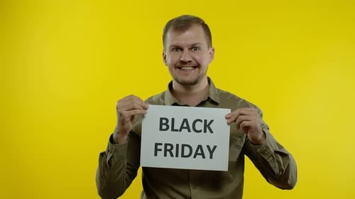 Enthusiastic Man Promoting Black Friday
