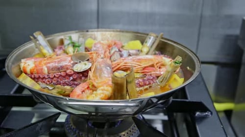 Delicious Seafood Cooking in a Stainless Steel Pan