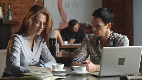 Female Business Partners in the Cafe