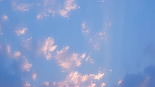 Pink and Blue Clouds with Sunlight