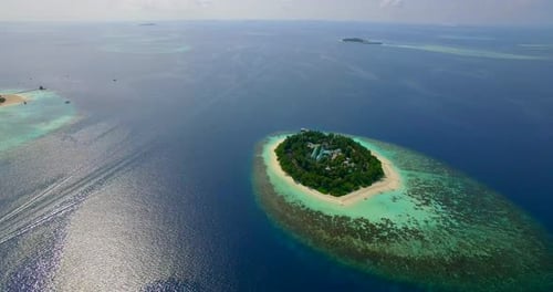 Aerial drone view of scenic tropical islands in the Maldives.