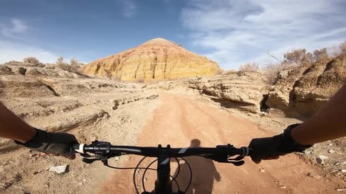 Cyclist Ride Bicycle at Mountain Road