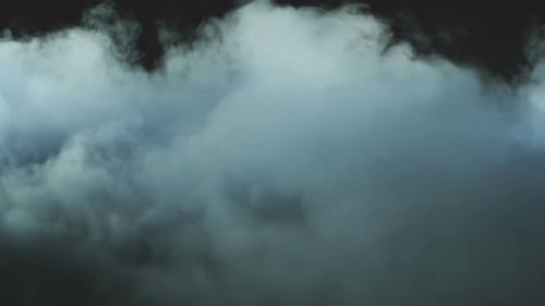 Abstract Light Blue Swirling Smoke Against Dark Background