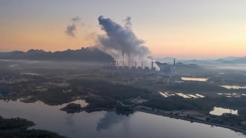 Aerial view Steam or mist over of Coal Power Plant.