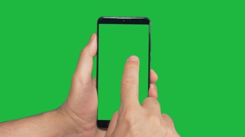 Hand Taps Smartphone with Green Screen