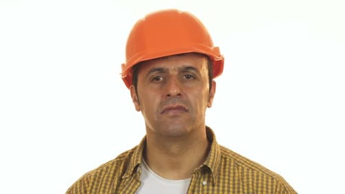 Mature Male Constructionist in Hardhat Looking Upset and Disappointed