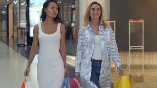 Two lovely ladies enjoying their shopping weekend