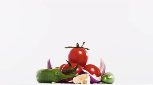Fresh Vegetables Pile on White Background, Tomatoes, Pepper