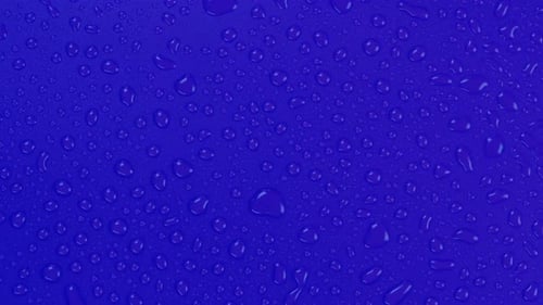 Rotating Blue Background with Water Drops Top View